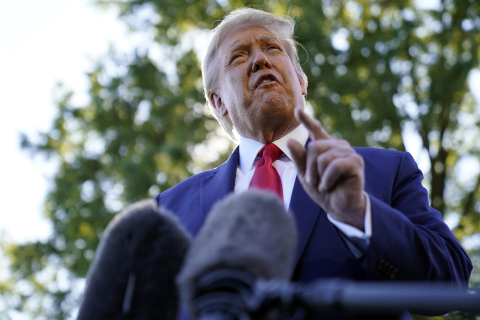 President Donald Trump speaks to reporters on the South Lawn of the White House, Monday, Sept. 21, 2020, before leaving for a short trip to Andrews Air Force Base, Md., and then onto Ohio for rallies. (AP Photo/Andrew Harnik)