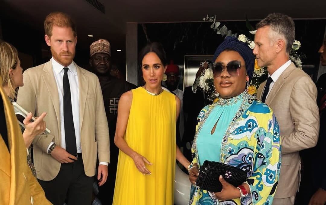 The Duke and Duchess of Sussex, pictured with Josh Kettler, right