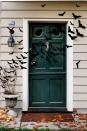 <p>Go big, bold, and batty this Halloween with a display you can DIY.<br></p><p><strong><a href="https://www.countryliving.com/diy-crafts/how-to/a4715/31-days-of-halloween-bat-filled-front-door/" rel="nofollow noopener" target="_blank" data-ylk="slk:Get the tutorial" class="link rapid-noclick-resp">Get the tutorial</a>.</strong> </p>