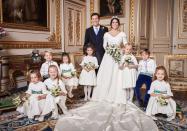 <p>In <a href="https://www.townandcountrymag.com/society/tradition/g23760972/princess-eugenie-jack-brooksbank-prince-george-princess-charlotte-official-wedding-portraits/" rel="nofollow noopener" target="_blank" data-ylk="slk:an official portrait taken just;elm:context_link;itc:0;sec:content-canvas" class="link ">an official portrait taken just</a> after Eugenie's wedding, Prince George gives a big smile while seated with the rest of the page boys and bridesmaids. </p>