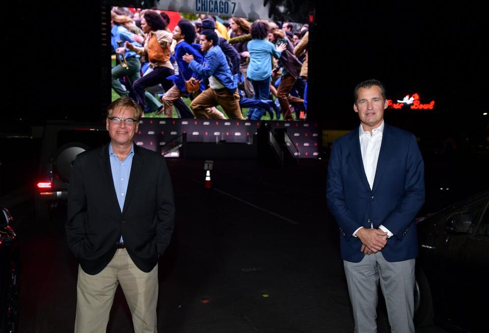 PASADENA, CALIFORNIA - OCTOBER 13:  (L-R) Aaron Sorkin and Scott Stuber, Vice President of Original Films at Netflix attend Netflix's "The Trial of the Chicago 7" Los Angeles Drive In Event at the Rose Bowl on October 13, 2020 in Pasadena, California. (Photo by Matt Winkelmeyer/Getty Images for Netflix)