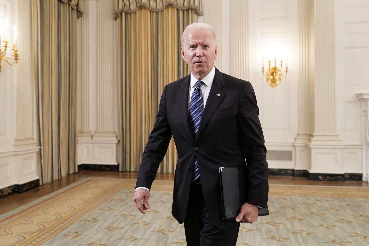 President Joe Biden walks out of the State Dining room after an event with Attorney General Merrick Garland at the White House in Washington, Wednesday, June 23, 2021, to discuss gun crime prevention strategy. (AP Photo/Susan Walsh)