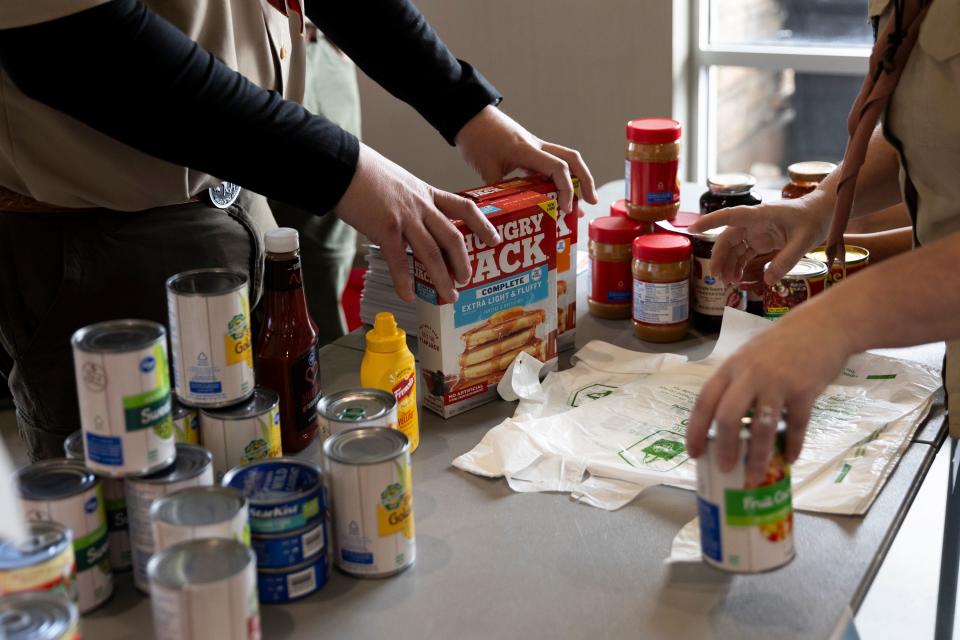 Troop 1996 collects food for a food drive at Smith’s Grocery in West Valley City on Saturday, Feb. 10, 2024. | Marielle Scott, Deseret News