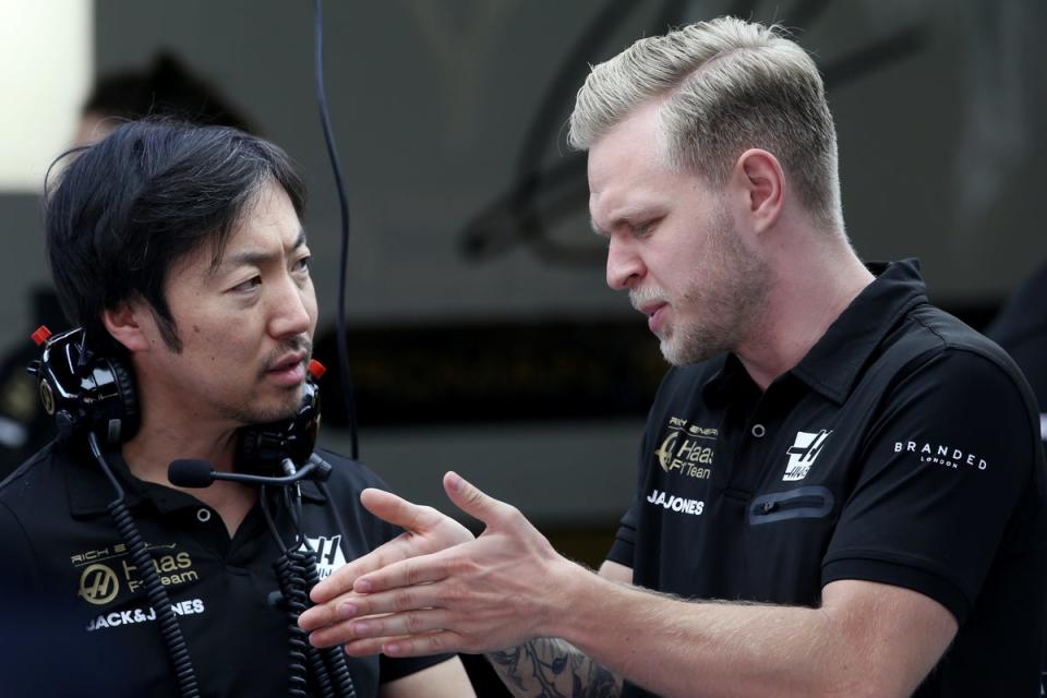 New team principal Ayao Komatsu with Haas driver Kevin Magnussen (Getty)