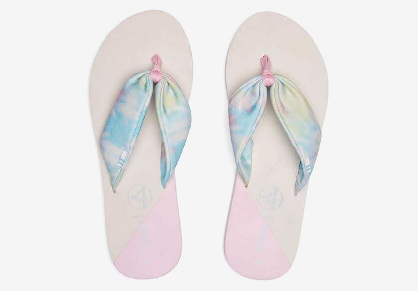 the tie-dye flip flops in multi-white