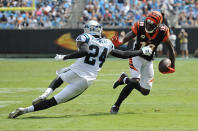 Cincinnati Bengals' A.J. Green (18) runs after a catches Carolina Panthers' James Bradberry (24) defends during the first half of an NFL football game in Charlotte, N.C., Sunday, Sept. 23, 2018. (AP Photo/Mike McCarn)