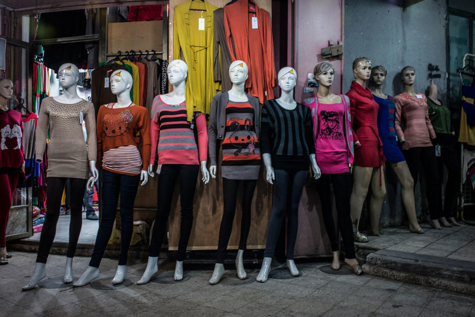 <p>Manequins show off available clothing in a shop near the main street of Gaza. (Photograph by Monique Jaques) </p>