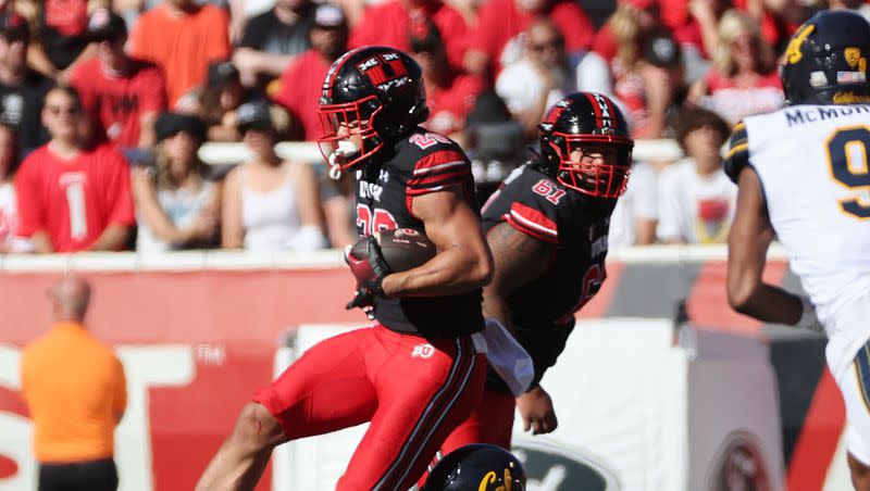 Utah Utes safety Sione Vaki (28) runs the ball against California Golden Bears linebacker Cade Uluave (27) in Salt Lake City on Saturday, Oct. 14, 2023. Utah won 34-14.