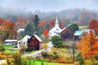 <p>An autumn fog rolls in over a small town near Waits River in Vermont.</p>