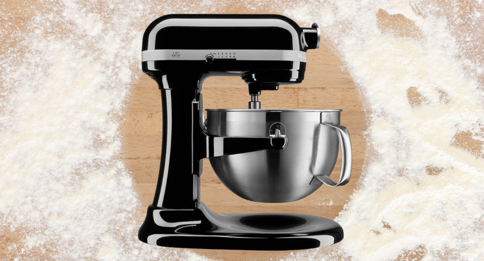 black KitchenAid mixer on countertop with flour