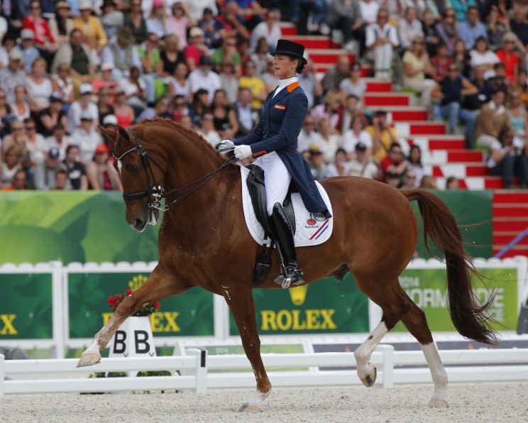 Adelinde Cornelissen of the Netherlands riding Jecih Parzival during the freestyle Grand Prix individual dressage competition at the FEI World Equestrian Games in France in 2014.  (AP)