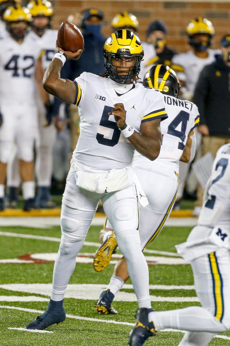 Michigan quarterback Joe Milton passes against Minnesota in the first quarter of an NCAA college football game Saturday, Oct. 24, 2020, in Minneapolis. (AP Photo/Bruce Kluckhohn)