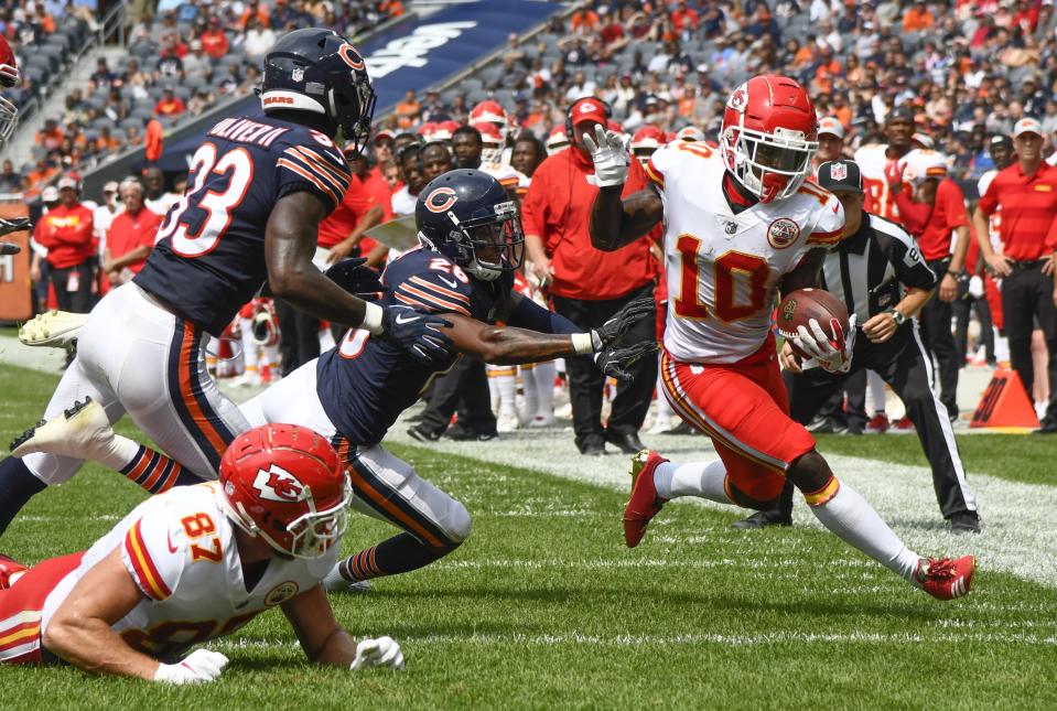 Kansas City Chiefs' Tyreek Hill is knocked out of bounds during the second half of a preseason NFL football game against the Chicago Bears Saturday, Aug. 25, 2018, in Chicago. (AP Photo/Matt Marton)
