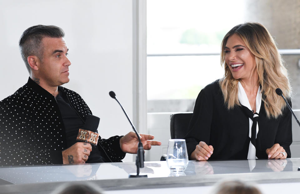 Robbie Williams and Ayda Field attending the X Factor photocall held at Somerset House, London. Photo credit should read: Doug Peters/EMPICS