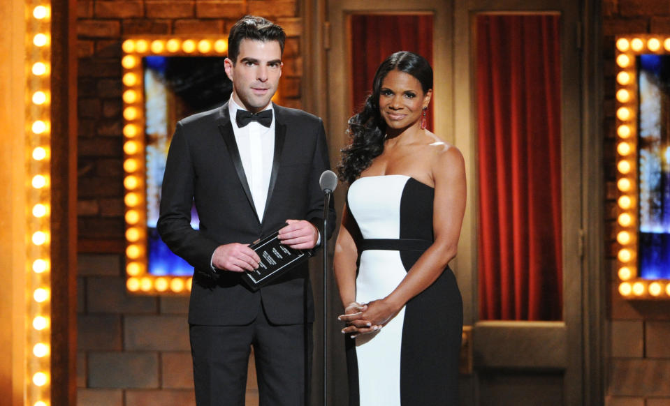 Actor Zachary Quinto, left, and actress, Audra McDonald present the Best Performance by an actor in a featured role in a play award at the 67th Annual Tony Awards, on Sunday, June 9, 2013 in New York. (Photo by Evan Agostini/Invision/AP)