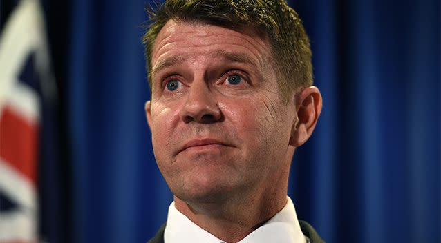 NSW Premier Mike Baird had already been forced to back down on his greyhound ban when two shark attacks prompted another change of direction on nets. Photo: AAP