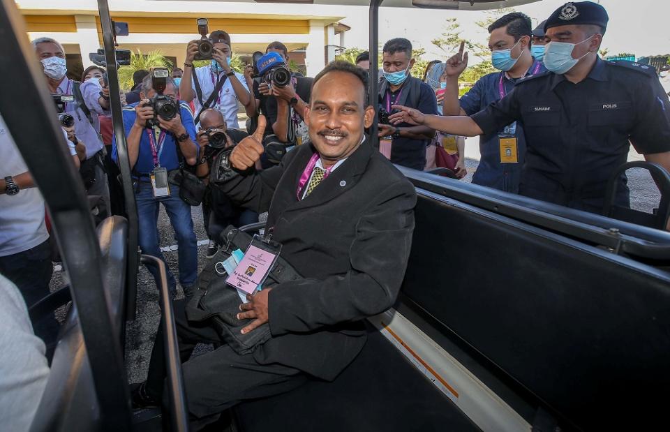 Independent candidate Santharasekaran Subramanian arrives at the nomination centre in Tanjung Malim August 15, 2020.