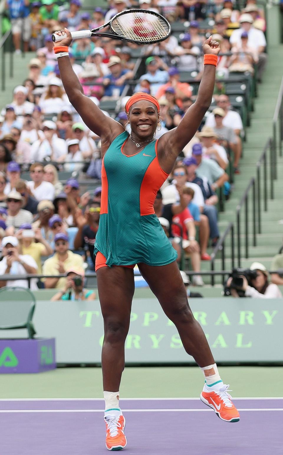 Serena Williams of the United States celebrates match point against Li Na of China during their final match during day 13 at the Sony Open at Crandon Park Tennis Cente on March on March 29, 2014 in Key Biscayne, Florida