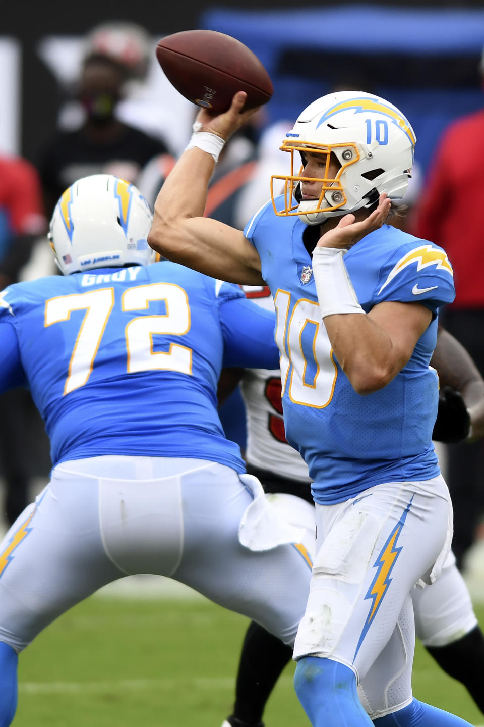 Los Angeles Chargers quarterback Justin Herbert (10) throws a pass against the Tampa Bay Buccaneers during the first half of an NFL football game Sunday, Oct. 4, 2020, in Tampa, Fla. (AP Photo/Jason Behnken)