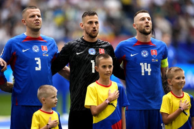 Slovakia captain Milan Skriniar (right) will make life tough for England 