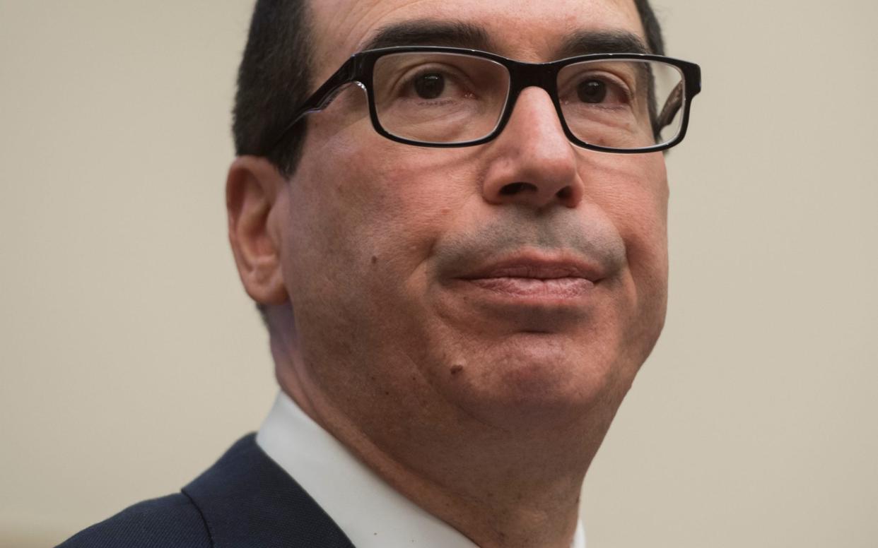 US Secretary of Treasury Steven Mnuchin is a former investment banker and Hollywood producer - AFP