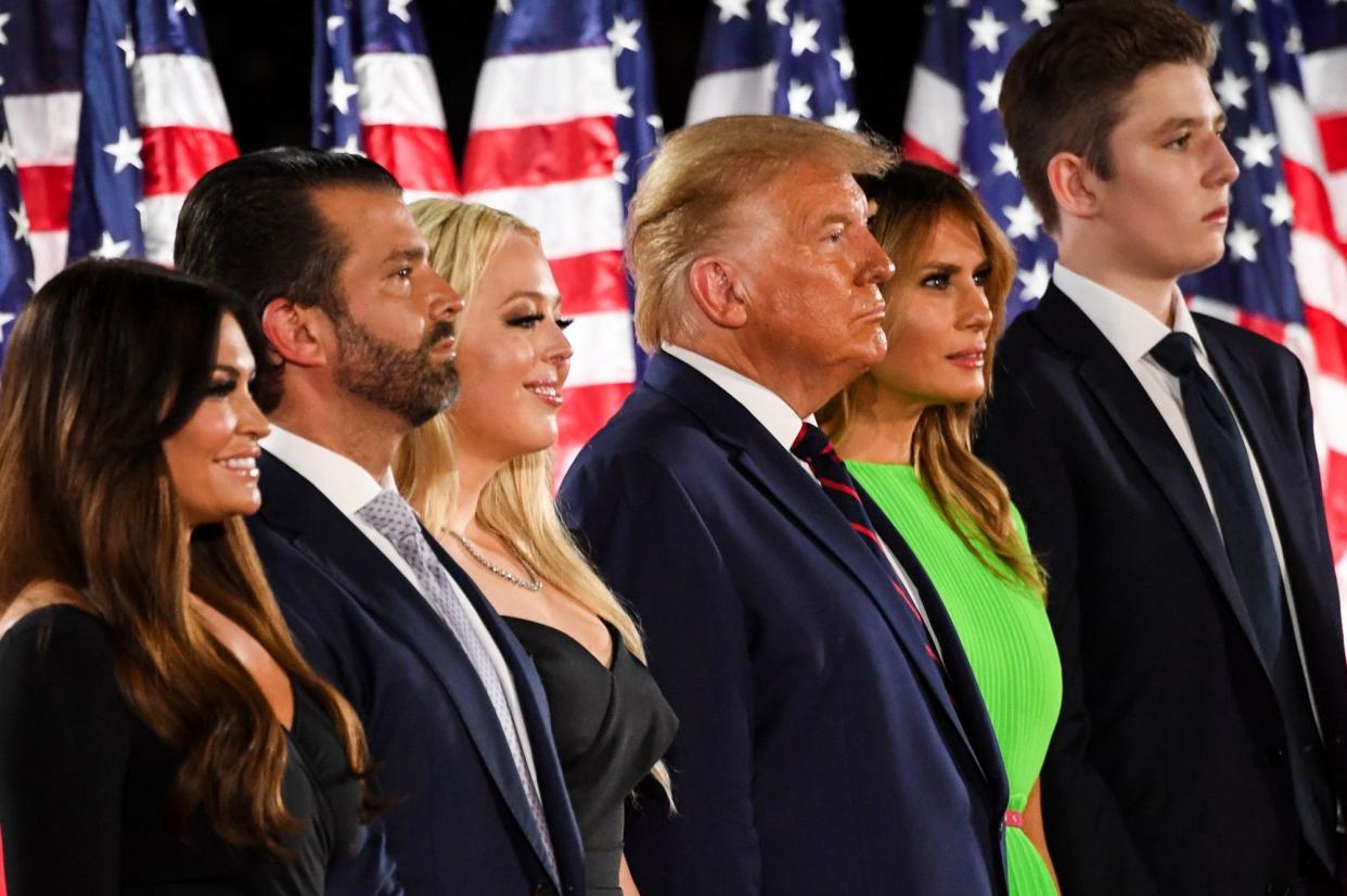 <span>From left, Kimberly Guilfoyle, Donald Trump Jr, Tiffany Trump, Donald Trump, Melania Trump and Barron Trump at the White House on 27 August 2020.</span><span>Photograph: Saul Loeb/AFP/Getty Images</span>