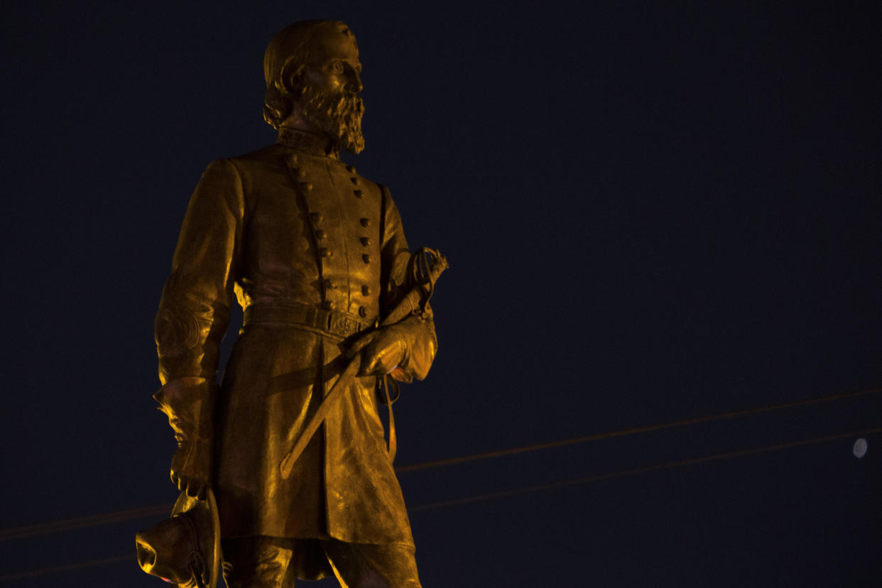 The statue of Confederate Lieutenant Genera A. P. Hill stands at the intersection of W. Laburnum Ave. and Hermitage Road in Richmond, Va. on Monday Dec. 12, 2022. The city of Richmond plans to begin the removal of the statue starting at 8:30 am Monday morning. (AP Photo/John C. Clark)