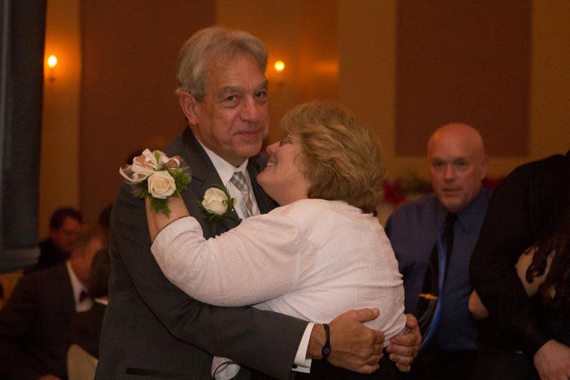 Rick Rotundo of Cincinnati dances with his wife, Kim.