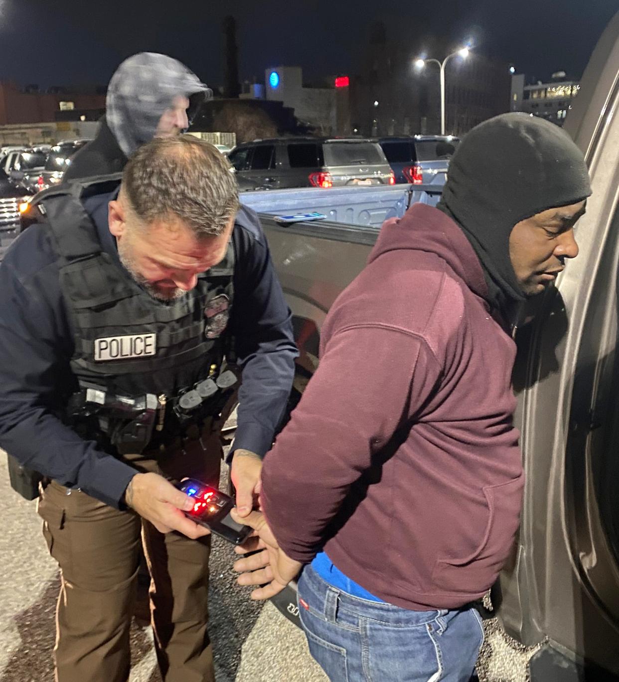 U.S. Immigration and Customs Enforcement officers arrest Jaconias Rosa Pereira in Worcester Wednesday. Pereira is a Brazilian criminal fugitive wanted for murder in Brazil.