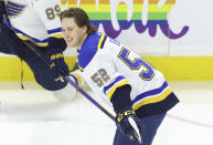 St. Louis Blues' Zach Dean (52) skates during warmups before an NHL hockey game against the Ottawa Senators in Ottawa, Ontario, on Thursday, March 21, 2024. (Patrick Doyle/The Canadian Press via AP)