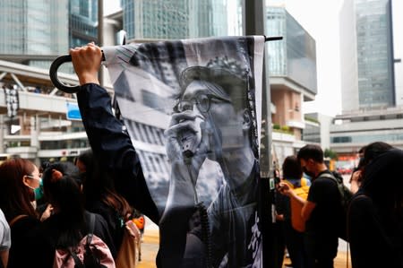 Supporters of jailed activist Edward Leung, gather outside the High Court as Leung appeals against his conviction and sentence, in Hong Kong