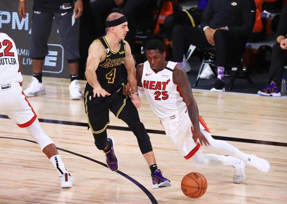Kendrick Nunn #25 of the Miami Heat drives the ball against Alex Caruso #4 of the Los Angeles Lakers during the third quarter in Game 5 of the 2020 NBA Finals at AdventHealth Arena at the ESPN Wide World Of Sports Complex on Oct. 9, 2020 in Lake Buena Vista.
