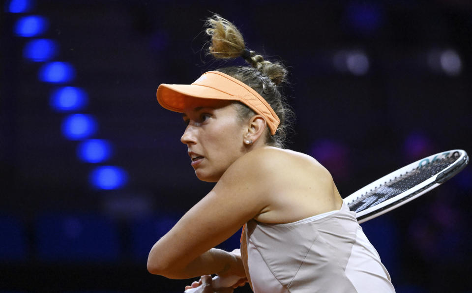 Belgium's Elise Mertens plays a return to Germany's Tatjana Maria during the WTA Tour tennis match in Stuttgart, Germany, Tuesday April 16, 2024. (Marijan Murat/dpa via AP)