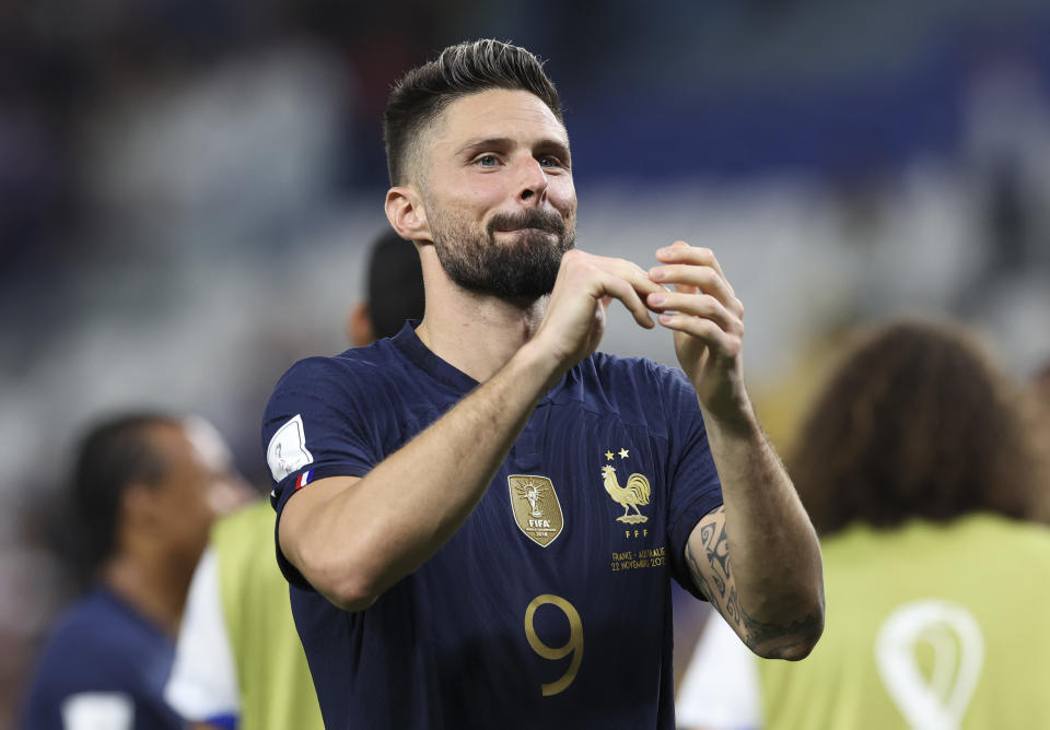 Seen here, France striker Olivier Giroud celebrates after his side's World Cup group win against the Socceroos.