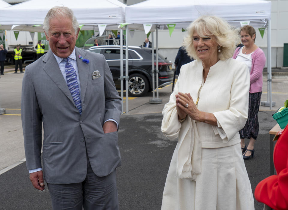 Britain's Prince Charles, Prince of Wales and Britain's Camilla, Duchess of Cornwall visit an Asda distribution centre to thank staff for their work during the coronavirus pandemic in Bristol, southwest England on July 9, 2020. (Photo by ARTHUR EDWARDS / POOL / AFP) (Photo by ARTHUR EDWARDS/POOL/AFP via Getty Images)