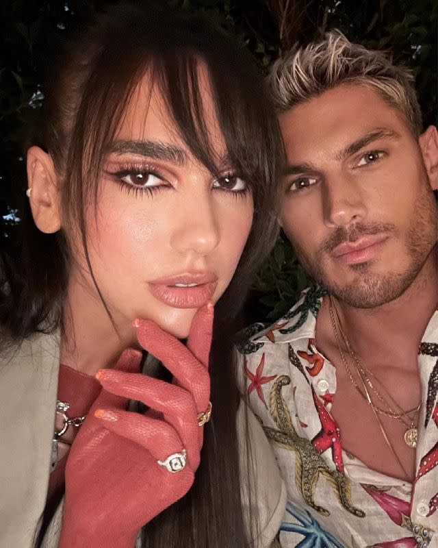 <p>Dua Lipa gave her go-to super long brown hair a 2021 update with a new wispy fringe courtesy of friend and A-list hairstylist Chris Appleton. The Brit award winner completed her new look with contoured cut crease eye make-up and sheer red gloves. As Appleton put it in his Instagram caption, 'Bang Bang'.</p><p><a href="https://www.instagram.com/p/CQUfHBWBBBe/" rel="nofollow noopener" target="_blank" data-ylk="slk:See the original post on Instagram;elm:context_link;itc:0;sec:content-canvas" class="link ">See the original post on Instagram</a></p>