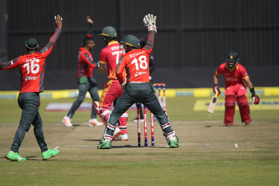 Bangladesh players appeal for the wicket of Zimbabwe batsman Sean Williams on the final day of the T20 match between Zimbabwe and Bangladesh at Harare Sports Club in Harare, Zimbabwe, Sunday, July 31, 2022. (AP Photo/Tsvangirayi Mukwazhi)