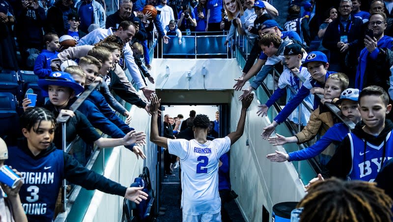 BYU guard Jaxson Robinson exits the court following the Cougars comback victory over TCU Saturday, March 2, 2024, at the Marriott Center in Provo.