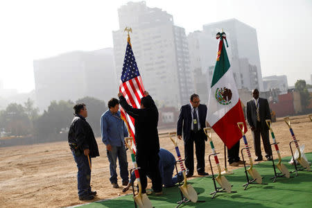 Employees prepare the stage where the new U.S. embassy will be built, during a ceremony to place the first stone of the embassy in Mexico City, Mexico February 13, 2018. REUTERS/Edgard Garrido