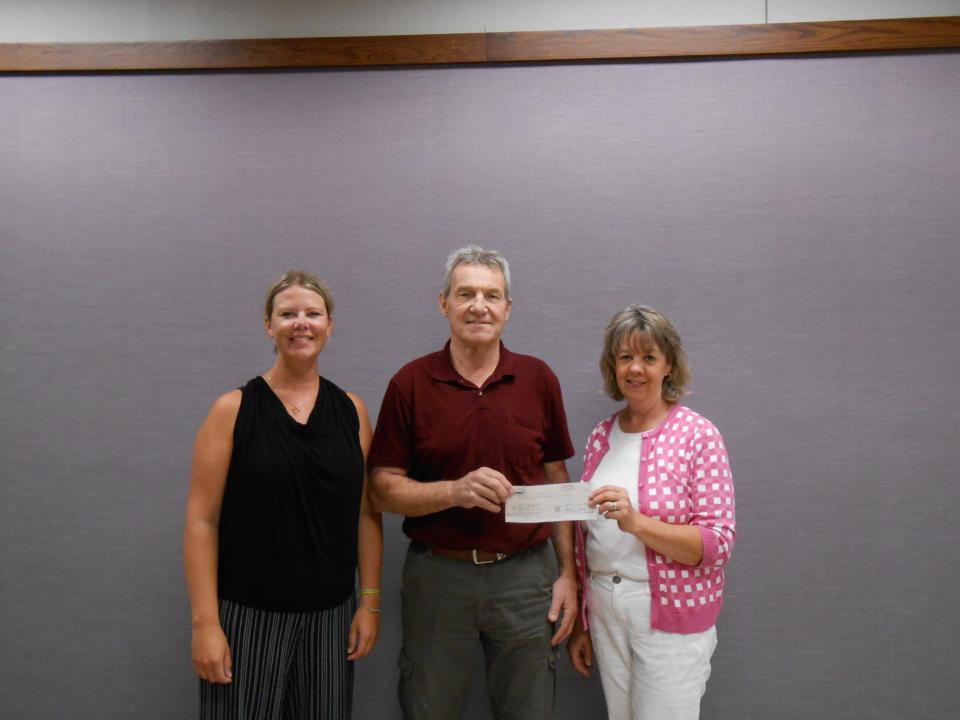 Devils Lake Area Foundation Committee Members Christy Remmick and Dawn Mertens with Terry Wallace with the Devils Lake Park Board.