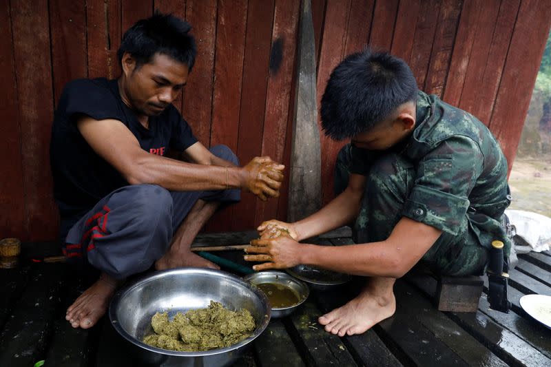 The Wider Image: In Myanmar jungle, civilians prepare to battle military rulers