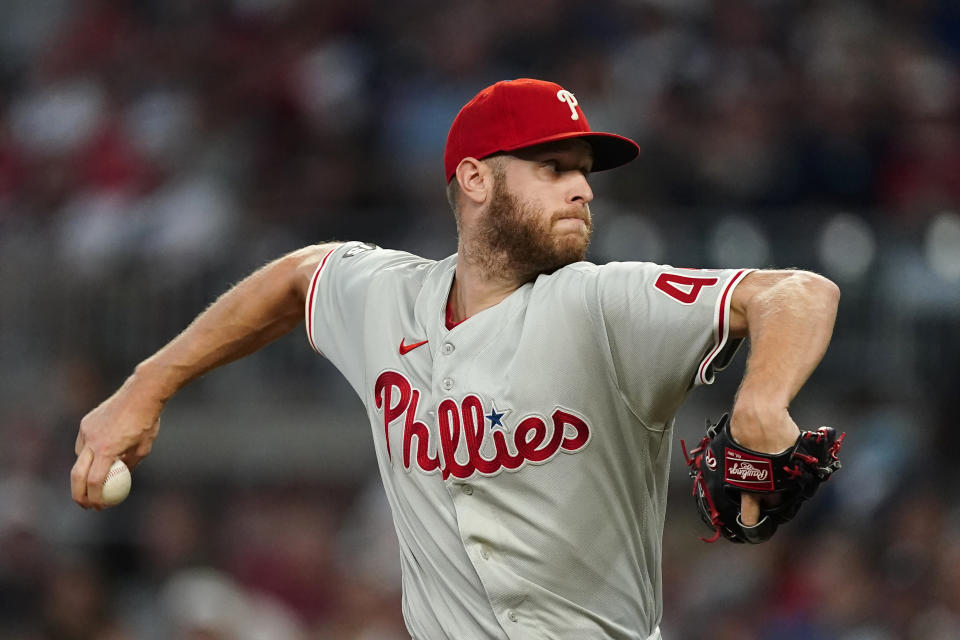 Philadelphia Phillies starting pitcher Zack Wheeler (45) works in the first inning of a baseball game against the Atlanta Braves Tuesday, Sept. 28, 2021, in Atlanta. (AP Photo/John Bazemore)