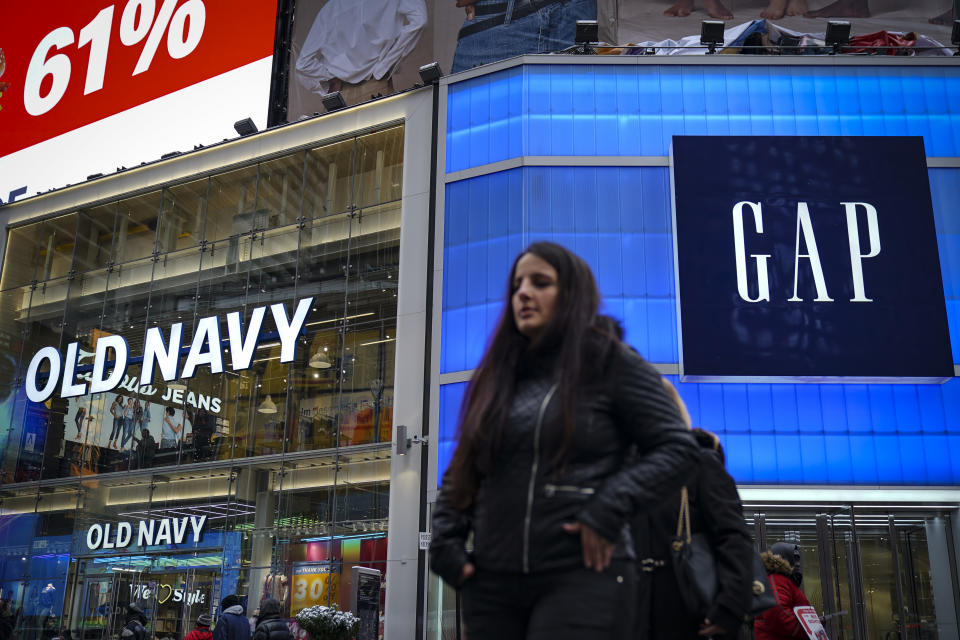 NEW YORK, NY - MARCH 01: Pedestrians walk past Old Navy and GAP stores in Times Square, March 1, 2019 in New York City. On Thursday, Gap Inc. announced plans to separate into two publicly traded companies, spinning off Old Navy into a separate firm as it closes about 230 Gap stores over the next two years. According to Gap Inc., Old Navy will become its own company, and the other company, which has not been named yet, will consist of the Gap brand, Athleta, Banana Republic, Intermix and Hill City. (Photo by Drew Angerer/Getty Images)