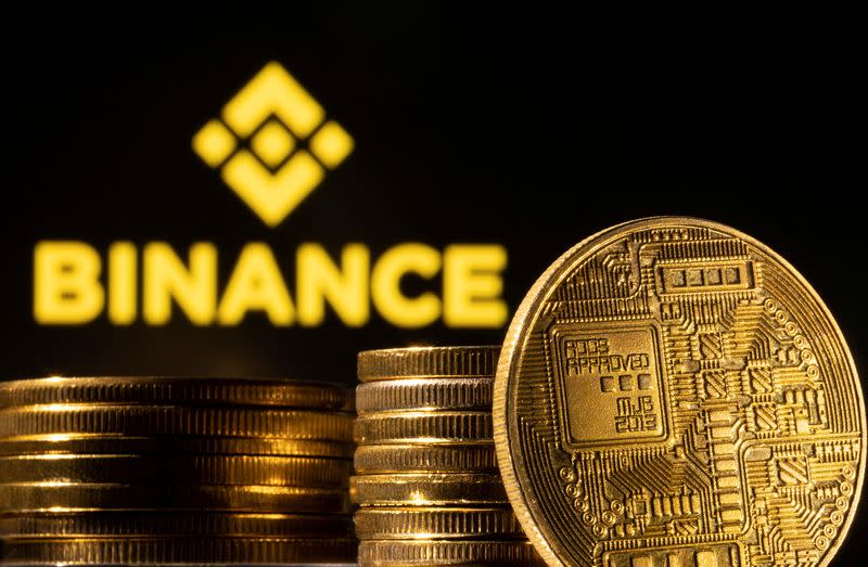 FILE PHOTO: Illustration shows a representation of cryptocurrency and Binance logo