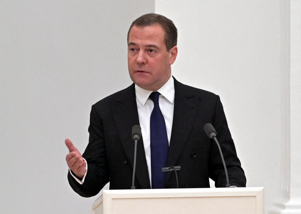 Deputy chairman of the Russian Security Council Dmitry Medvedev speaks during a meeting with members of the Security Council in Moscow on February 21, 2022. - Russian President Vladimir Putin said on February 21, 2022, he would make a decision 