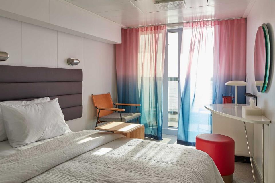 Interior of a guest cabin on the Virgin Voyages’ Scarlet Lady cruise ship