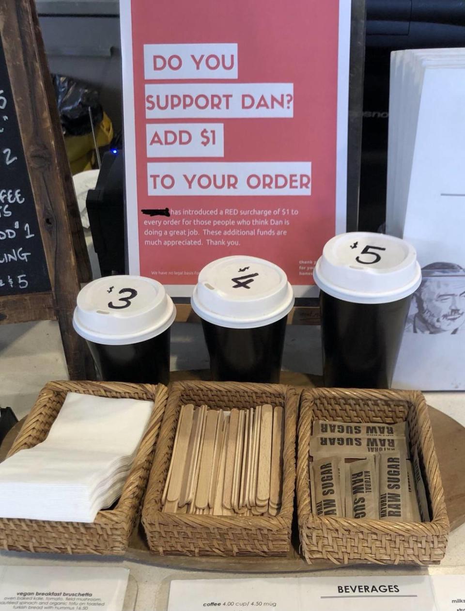 A Melbourne café is asking customers who support the Premier to pay $1 extra. Source: Reddit