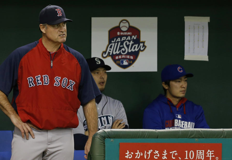 U.S. Major League Baseball (MLB) All-Stars manager John Farrell of the Boston Red Sox reacts at the bench during the eighth inning of an exhibition baseball game against Japan in Tokyo November 15, 2014. REUTERS/Yuya Shino (JAPAN - Tags: SPORT BASEBALL)