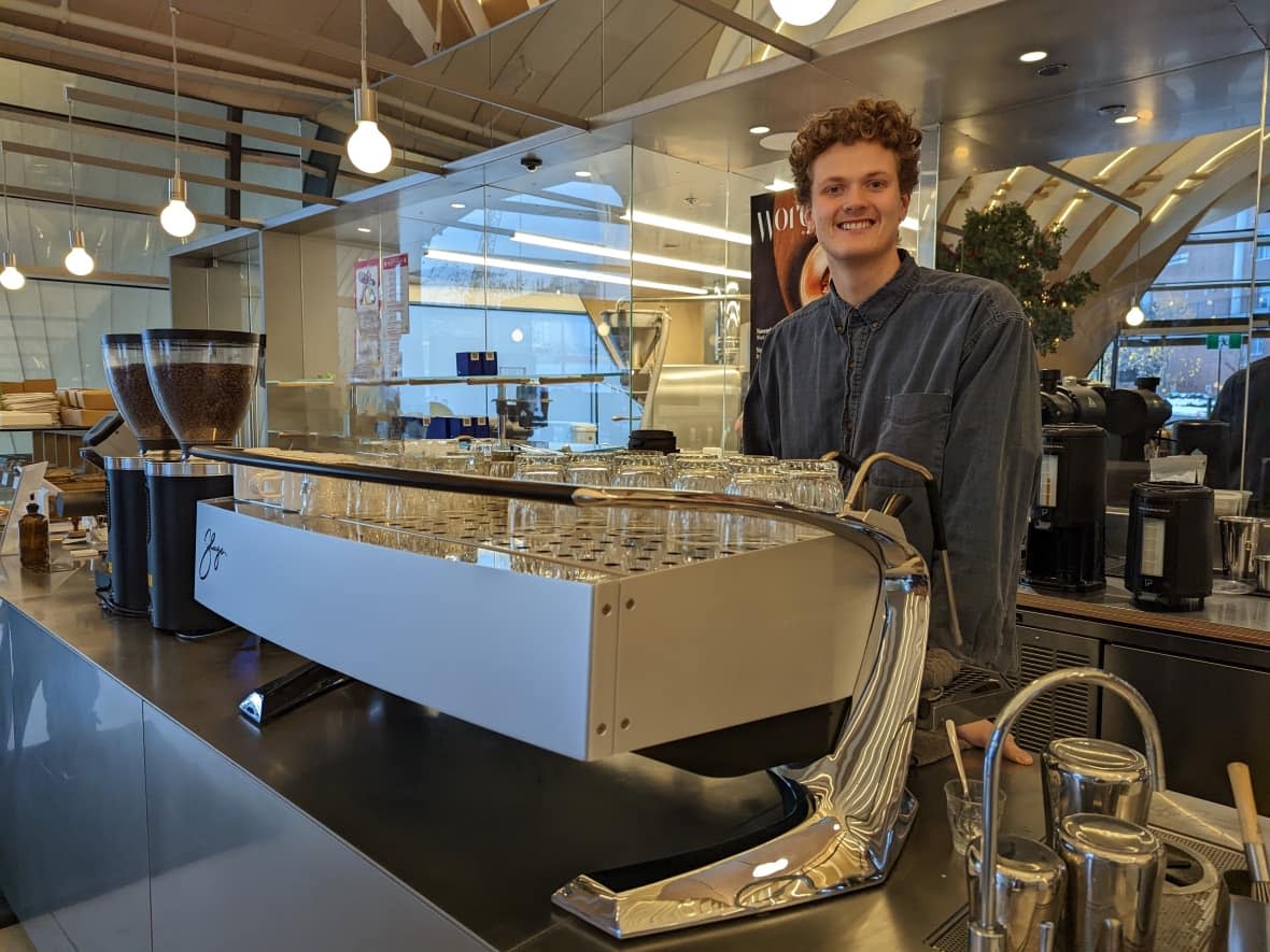 Jeremiah Macadam, a barista at Vancouver's Nemesis Coffee, will represent Canada at the World Aeropress Championships. (Jon Azpiri/CBC - image credit)