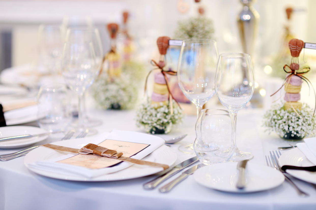 The bride and groom served different food depending on the guest's gender. [Photo: Getty]